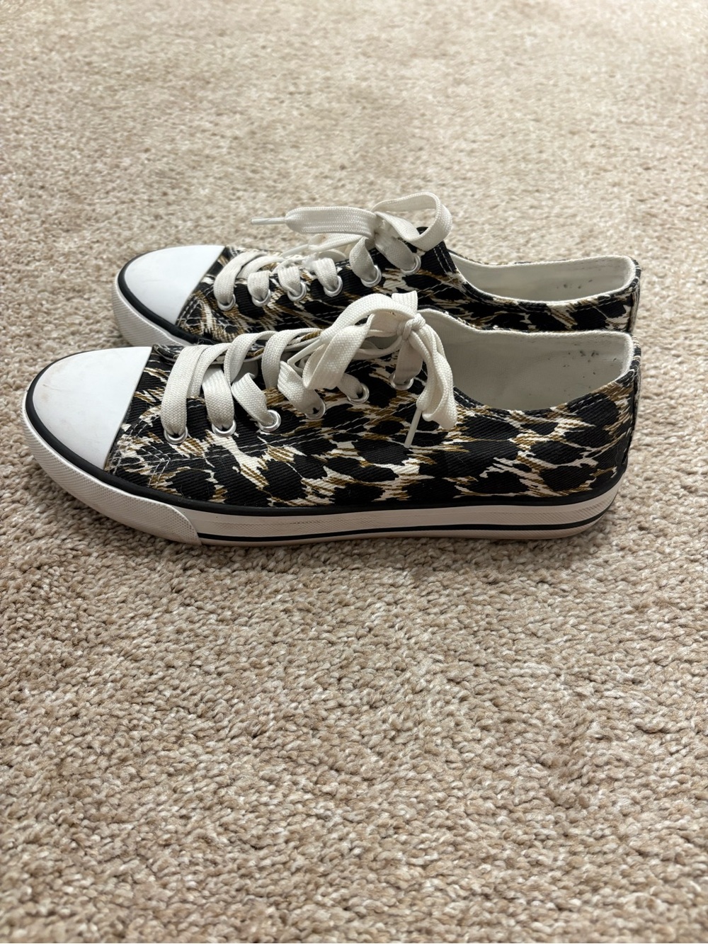 ASOS Leopard Print Low-Top Sneakers in Black and Cream
